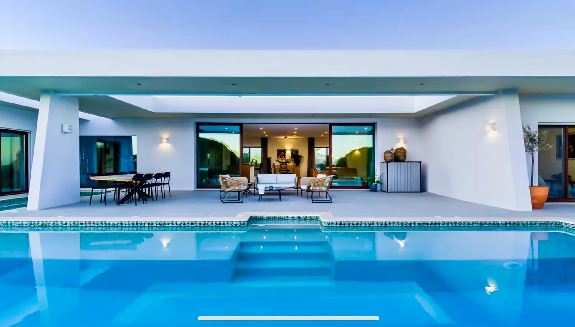 Front view of Villa Porches opening onto the pool