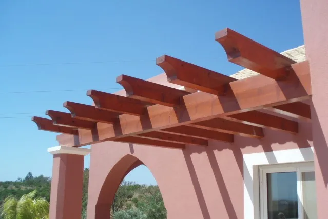 Timber pergola beams above the terrace at Quinta do Monte Funchal, Lagos