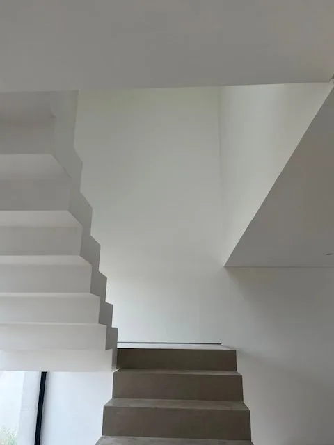 Interior staircase with finishing work in progress at Porto de Mós, Lagos